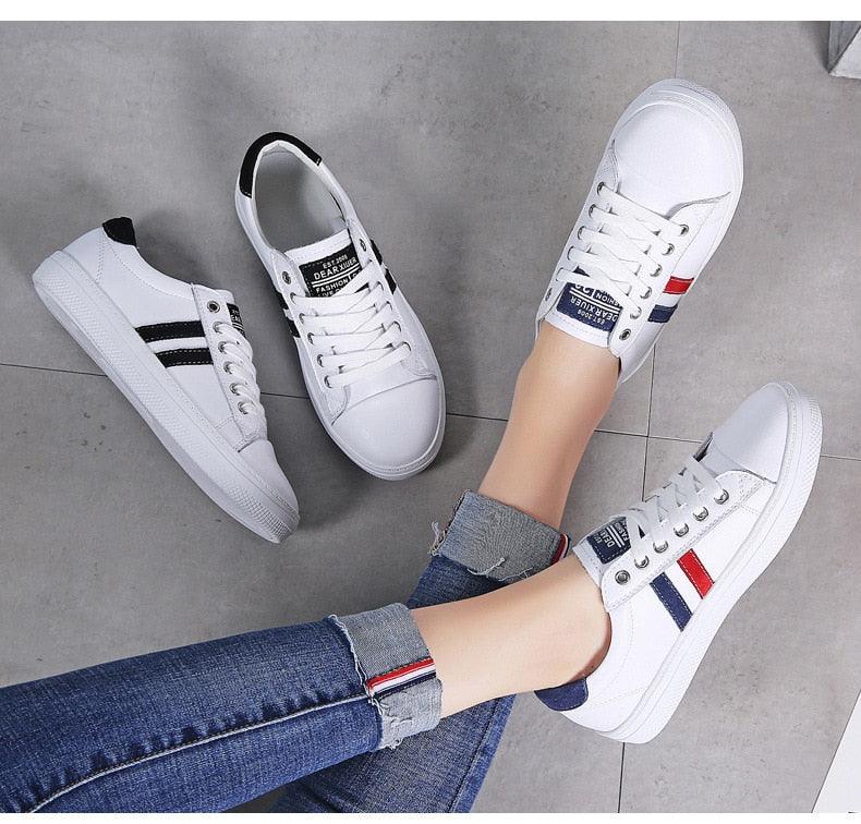 Stevvex women's white leather sneakers with red blue stripes, three pairs shown on Tampa Home & Garden Store