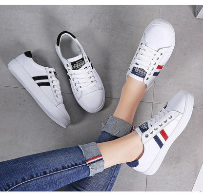Stevvex women's white leather sneakers with red blue stripes, three pairs shown on Tampa Home & Garden Store
