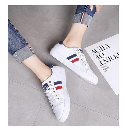 Stevvex white leather sneakers with red and navy side stripes, lace-up fashion shoes pair on Tampa Home & Garden Store
