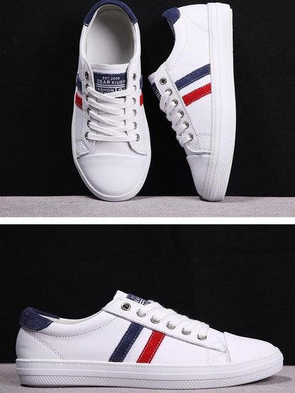 Women's white leather sneakers with red and blue side stripes by Stevvex on Tampa Home & Garden Store