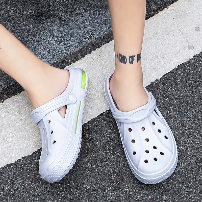 Stevvex white unisex slip-on sandals with perforated upper, back strap and lime-green accent on Tampa Home & Garden Store
