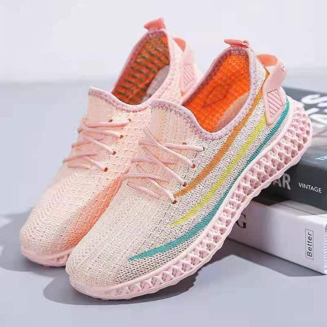 Women's Stevvex running sneakers in peach breathable mesh with multicolor side stripe and lightweight non-slip sole on Tampa Home & Garden Store