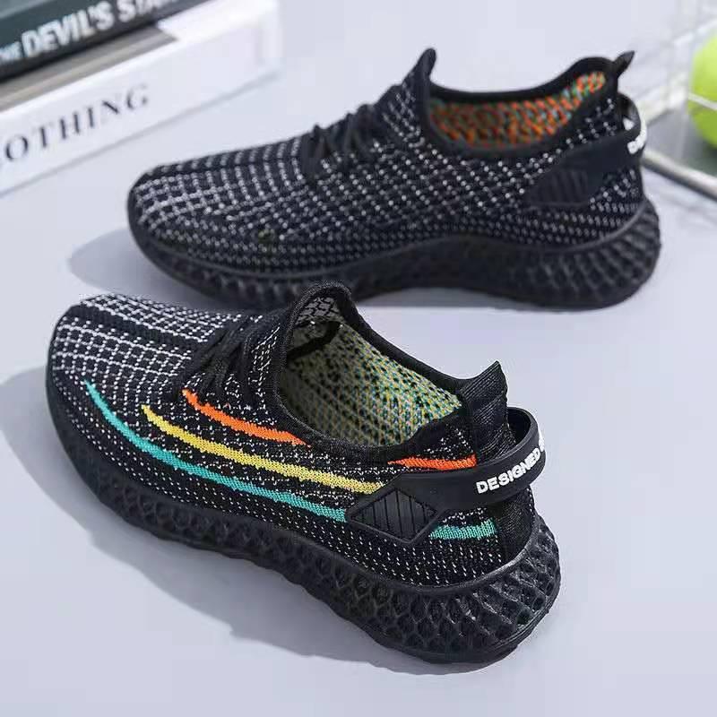 Stevvex women's running sneakers pair, black breathable mesh with colorful stripe accents on Tampa Home & Garden Store