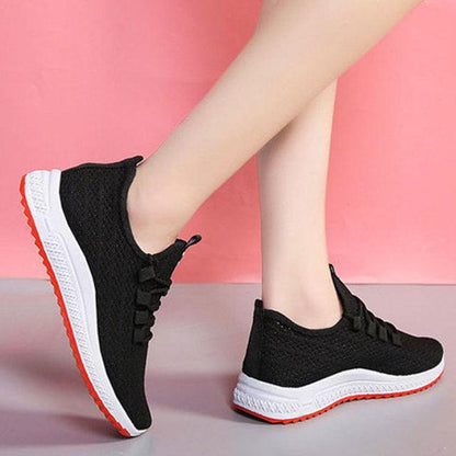 Women's running sneakers pair, Stevvex, black breathable mesh with white midsole on Tampa Home & Garden Store