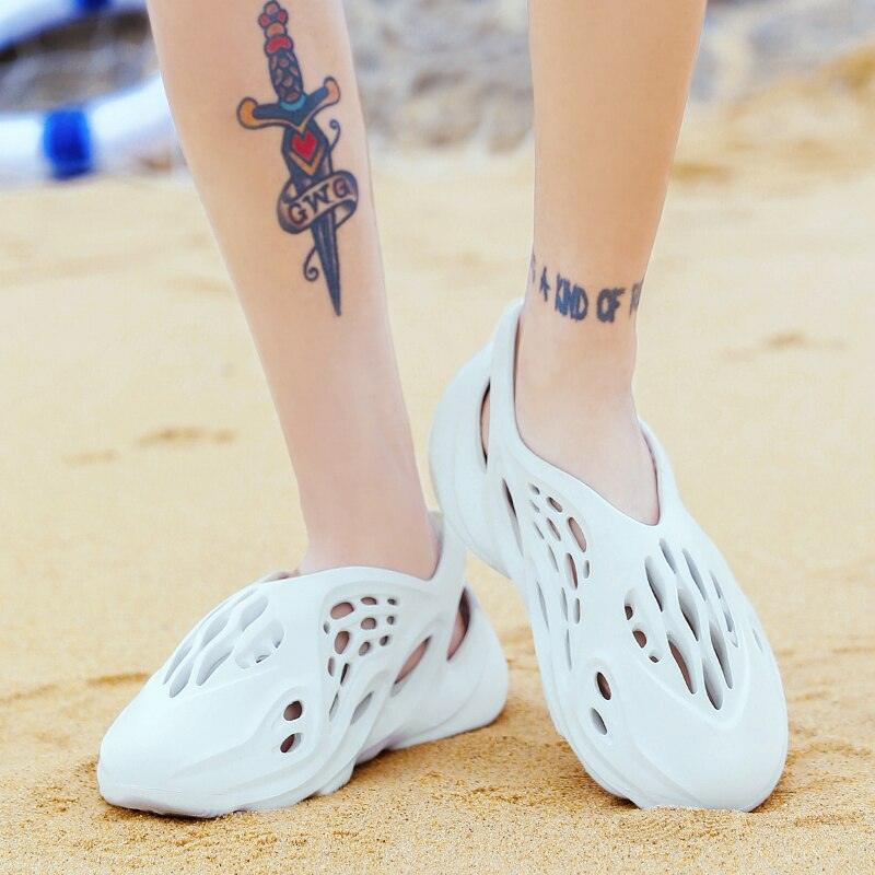 Stevvex women's white rubber sandals with ventilation holes breathable clogs pair on Tampa Home & Garden Store