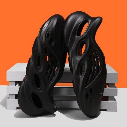 Women's black rubber sandals with hollow cutouts by Stevvex for garden and pool on Tampa Home & Garden Store
