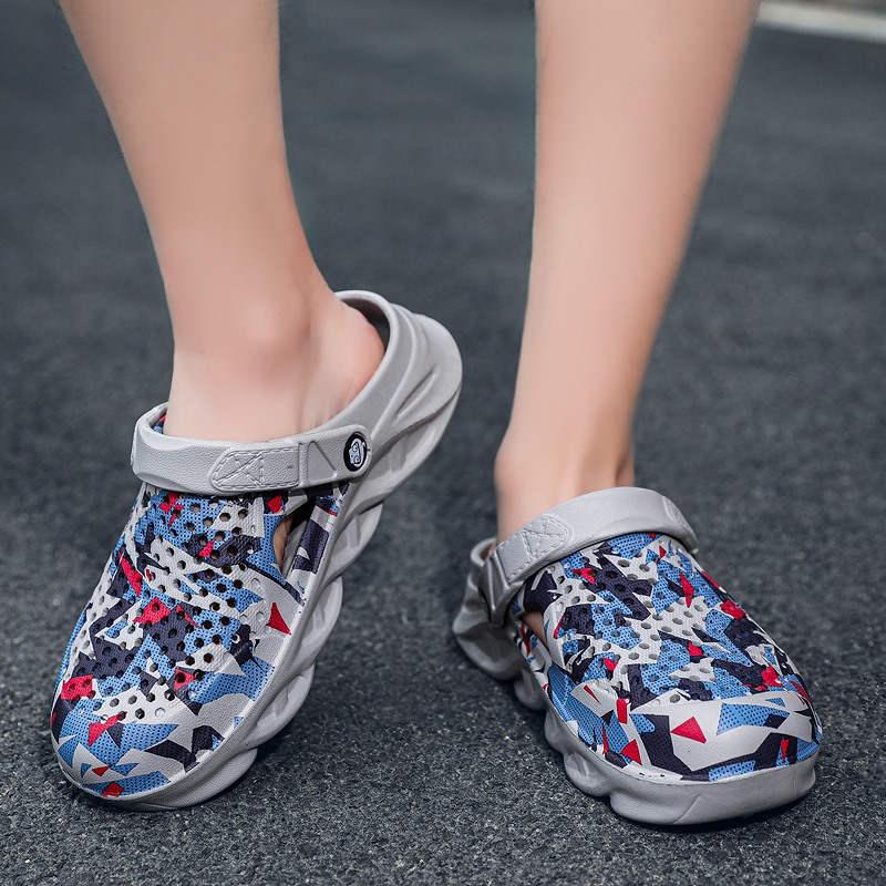 Pair of Stevvex women's cushioned slip-on slippers with blue geometric uppers and gray straps on Tampa Home & Garden Store