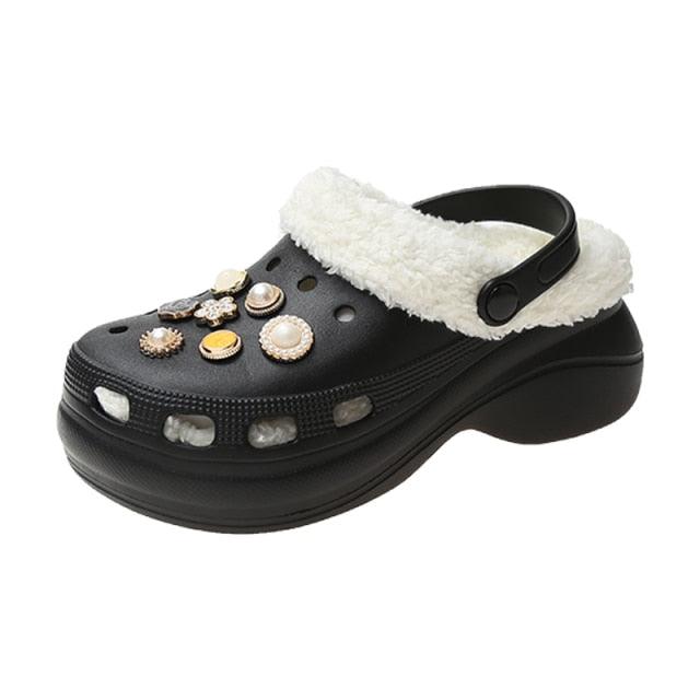 Women's fur-trimmed black platform clogs by Stevvex with back strap and jeweled accents on Tampa Home & Garden Store