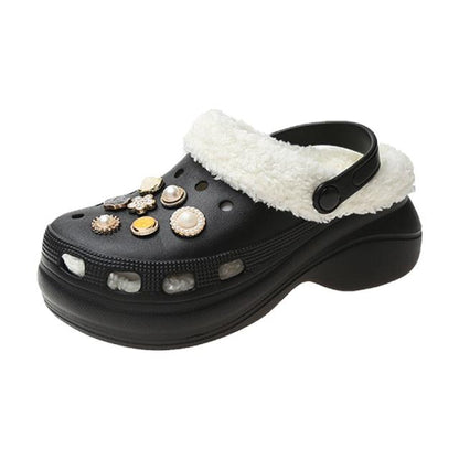 Women's fur-trimmed black platform clogs by Stevvex with back strap and jeweled accents on Tampa Home & Garden Store