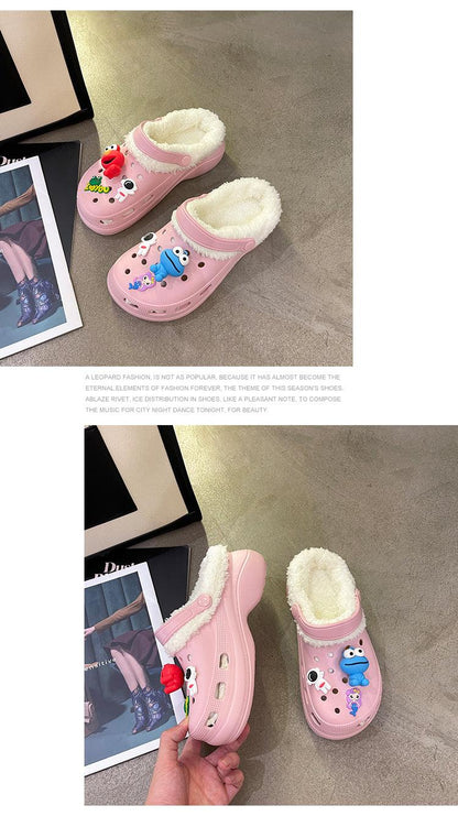 Stevvex women's pink fuzzy-lined slip-on slippers with cartoon faces, plush interior, pair on Tampa Home & Garden Store
