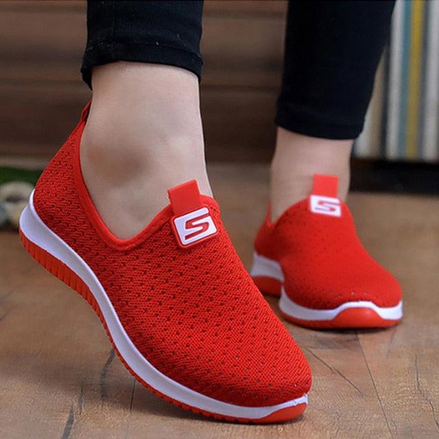 Stevvex red slip on breathable mesh sneakers pair with white sole on Tampa Home & Garden Store