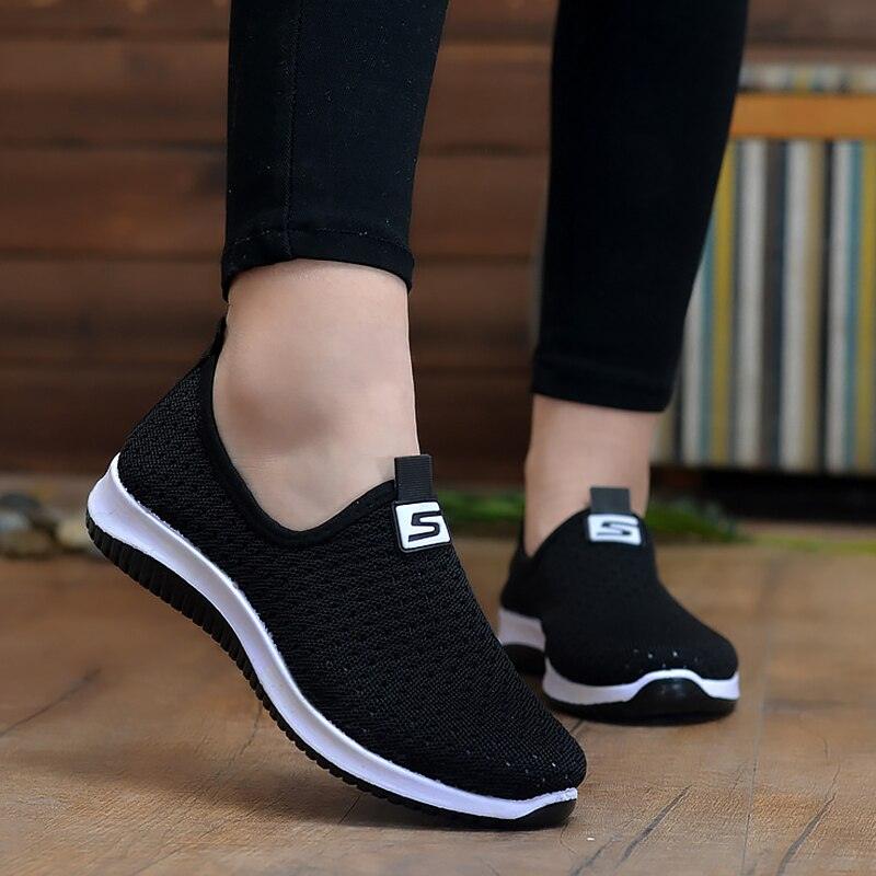 Stevvex womens slip-on sneakers pair in black breathable mesh with white sole and S logo tab on Tampa Home & Garden Store