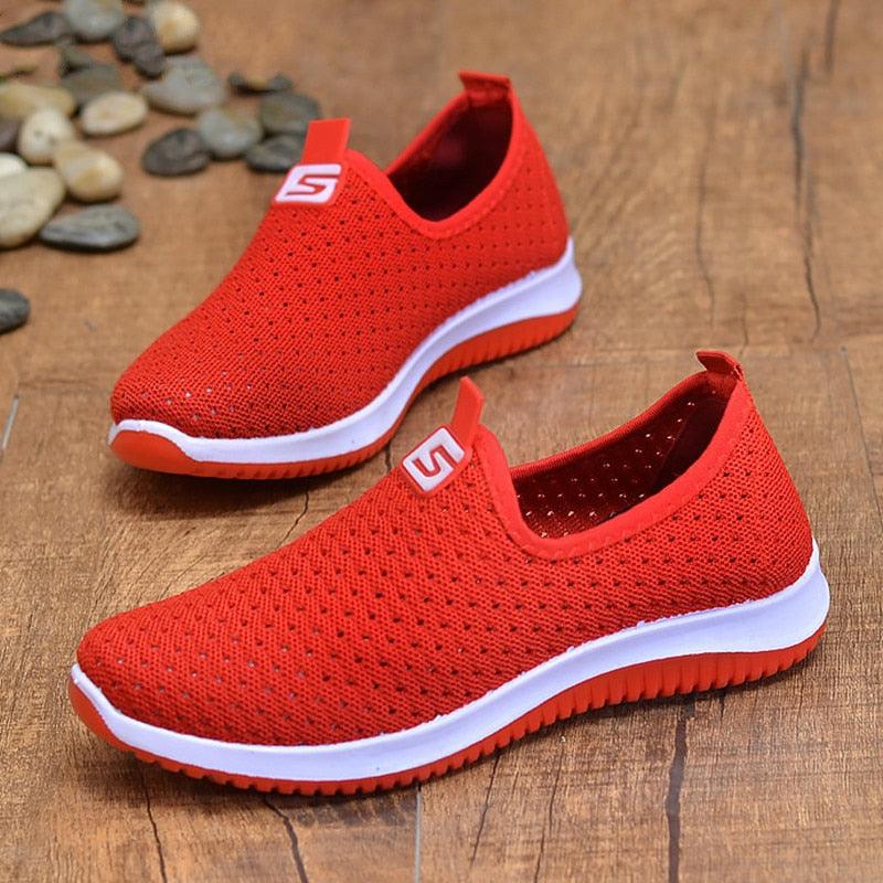 Stevvex women's red mesh slip-on sneakers with white sole and orange sole, logo S pull-tab pair on Tampa Home & Garden Store