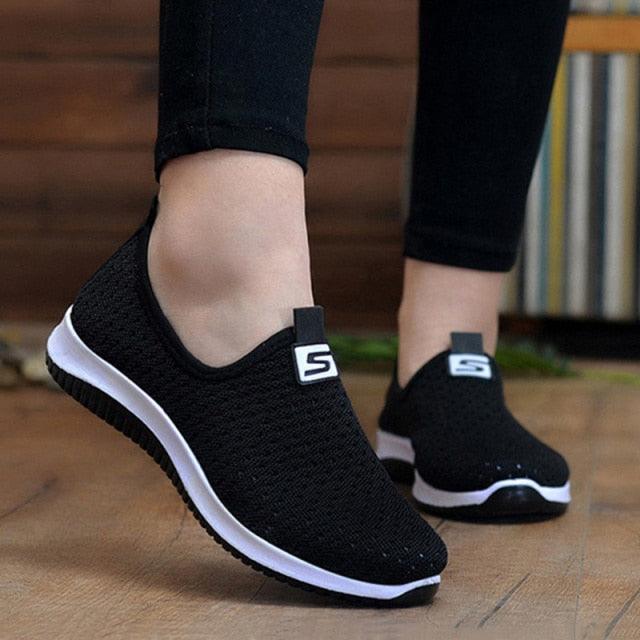 Women's slip-on sneakers Stevvex, black breathable knit mesh with white sole and logo pull-tab on Tampa Home & Garden Store