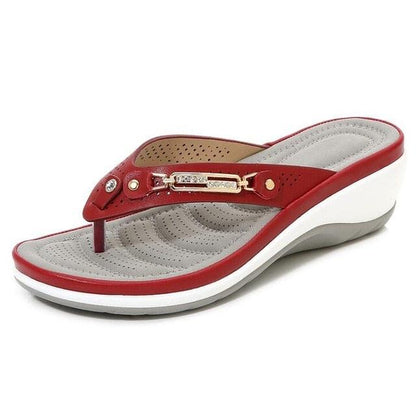 Stevvex red metal-button thong sandals with arch support and thick white wedge sole on Tampa Home & Garden Store