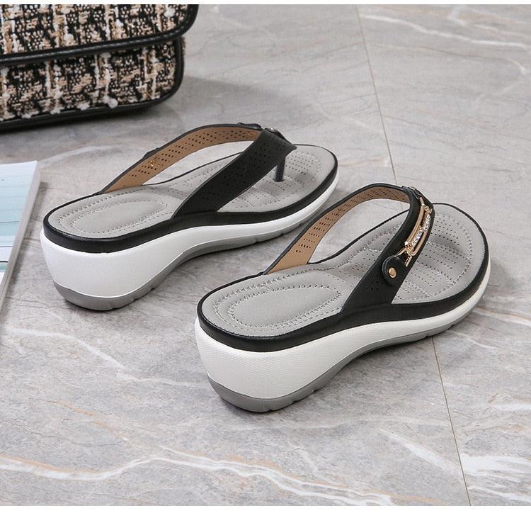 Stevvex pair of women's platform thong sandals with black straps, thick sole, arch support on Tampa Home & Garden Store