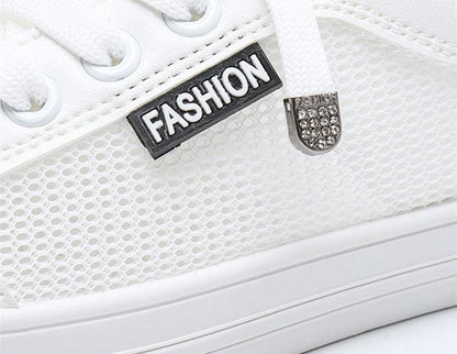 Stevvex women's white mesh sneakers with lace-up closure and fashion badge on Tampa Home & Garden Store