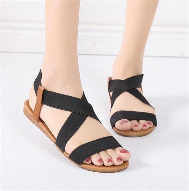 Women Sandals Stevvex with black elastic crisscross straps and ankle strap tan sole on Tampa Home & Garden Store