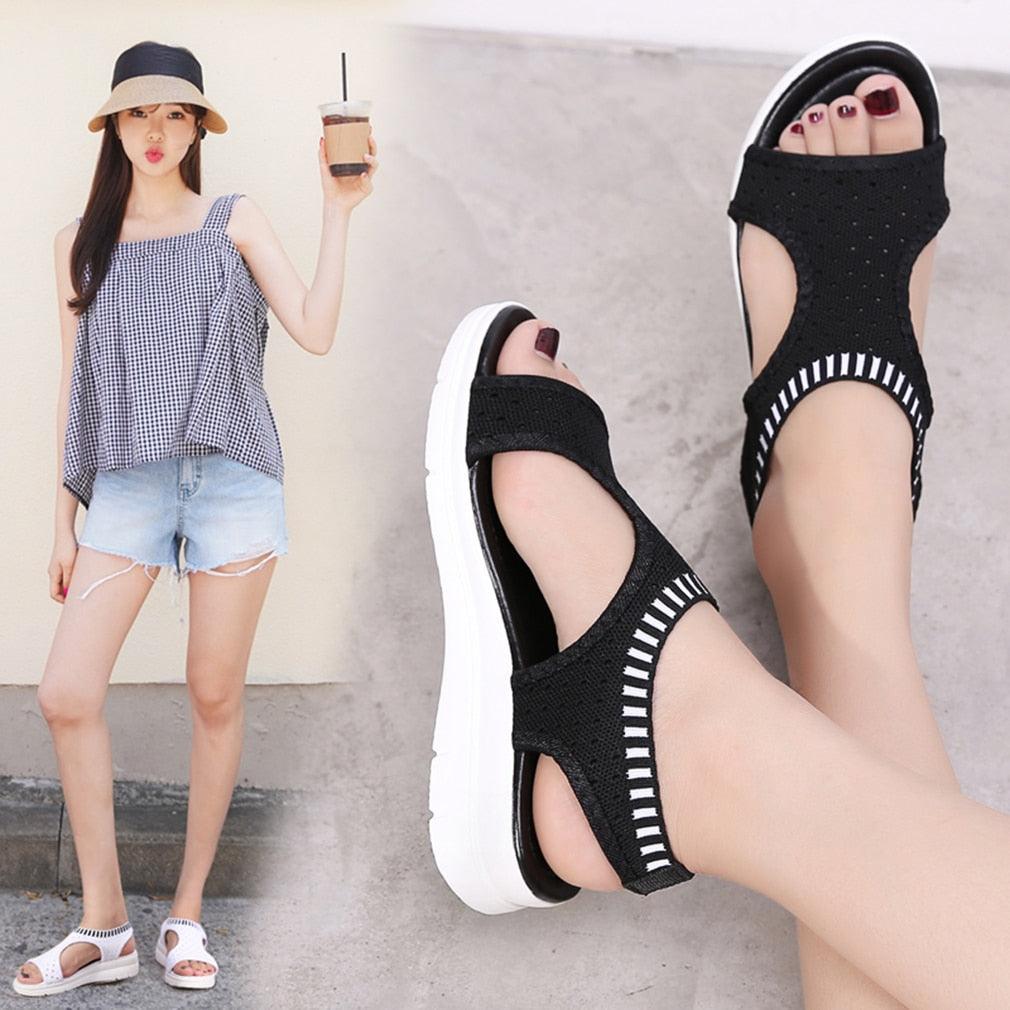 Stevvex black knit sandals with elastic ankle strap and white platform sole; two styles shown on Tampa Home & Garden Store
