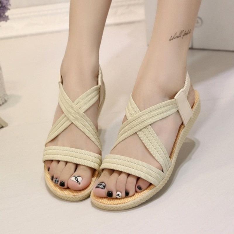 Stevvex beige sandals with crisscross fabric straps and ankle elastic espadrille sole on Tampa Home & Garden Store