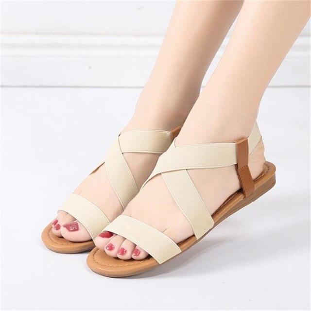 Stevvex beige cross-strap sandals with ankle elastic and platform sole on Tampa Home & Garden Store