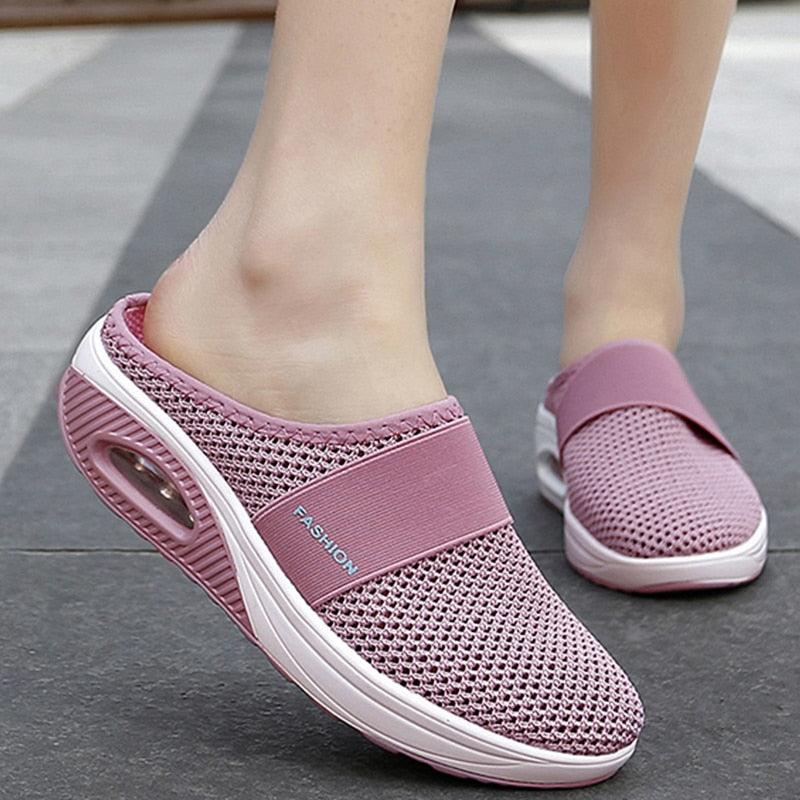 Women pink mesh slip-on platform sandals pair with breathable knit upper and air-cushion sole on Tampa Home & Garden Store