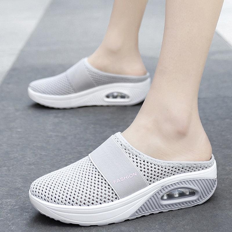 Pair of Stevvex women's mesh platform sandals, white slip-ons with air cushion sole on Tampa Home & Garden Store
