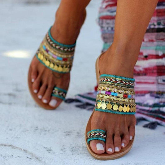 Women boho sandals with turquoise braided straps, toe ring accent and gold coin cuffs on Tampa Home & Garden Store