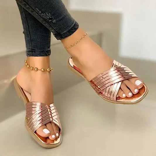 Women rose gold metallic sandals with crisscross straps, open-toe flat slide with back strap on Tampa Home & Garden Store