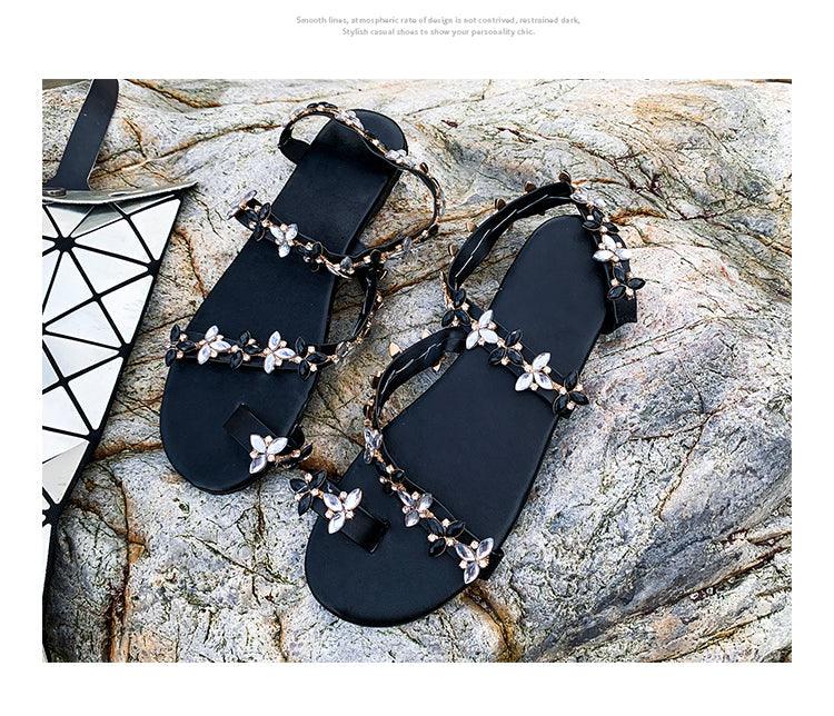 Women sandals black with open-toe design and pearl flower-embellished straps, pair on Tampa Home & Garden Store