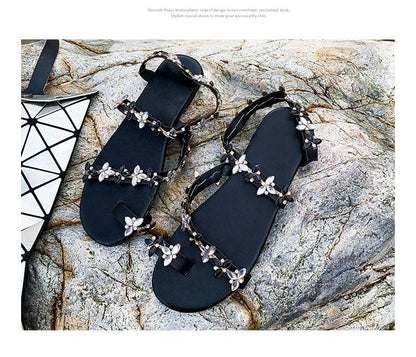 Women sandals black with open-toe design and pearl flower-embellished straps, pair on Tampa Home & Garden Store