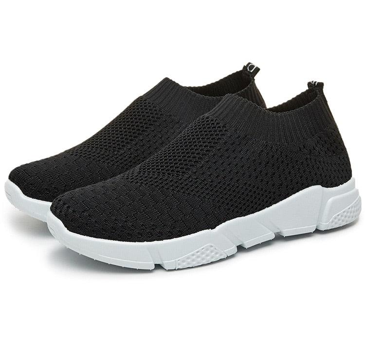 Stevvex women's slip-on black knit sneakers with white chunky sole pair on Tampa Home & Garden Store