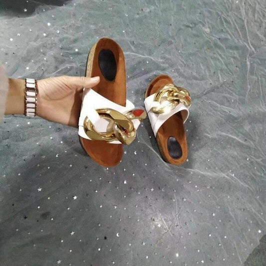 Women white leather sandals with gold chain ornament, flat open-toe Stevvex slip-ons pair on Tampa Home & Garden Store