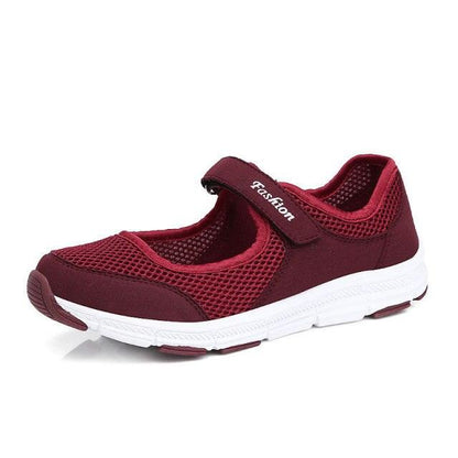 Women sneakers with burgundy mesh upper and hook-and-loop strap, white lightweight sole on Tampa Home & Garden Store