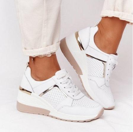 Stevvex white lace-up sneakers with perforated mesh and metallic accents pair on Tampa Home & Garden Store