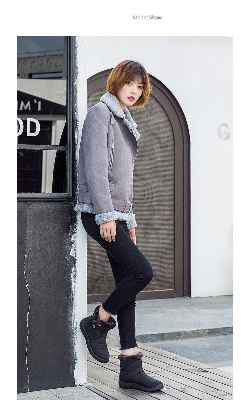 Women snow boots fur-lined black ankle boots worn by model on Tampa Home & Garden Store