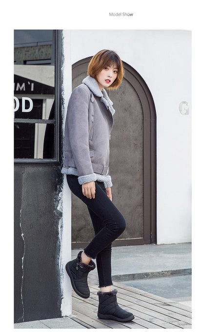 Women snow boots fur-lined black ankle boots worn by model on Tampa Home & Garden Store