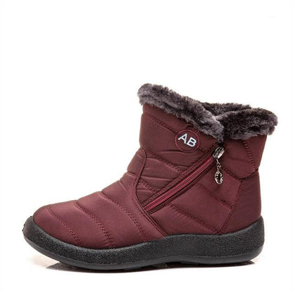 Stevvex burgundy fur-lined snow boot with side zipper, AB logo, quilted panels, black sole on Tampa Home & Garden Store