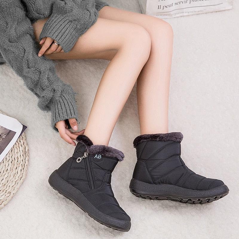 Stevvex Women Snow Boots pair with black fur lining, zip side, anti-slip outsole on Tampa Home & Garden Store