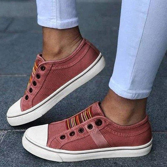 Stevvex women's red canvas low-cut sneakers with white rubber toe cap and sole on Tampa Home & Garden Store