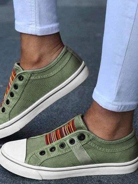 Stevvex women's green canvas sneakers, low-cut slip-ons with striped tongue and white toe cap on Tampa Home & Garden Store