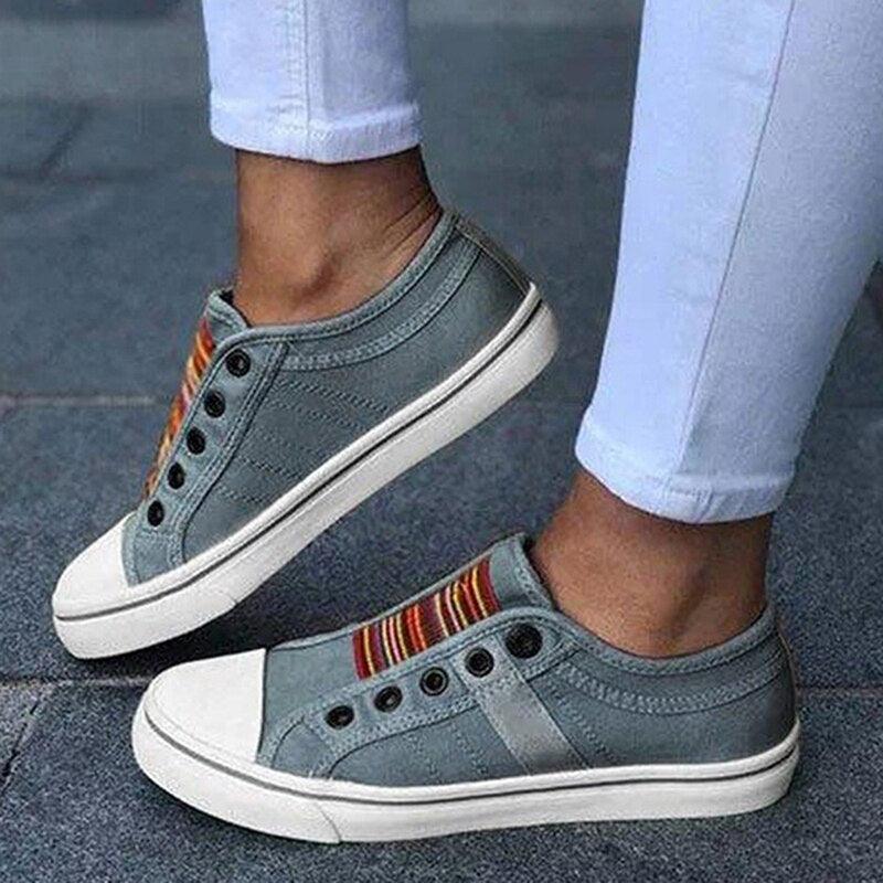 Stevvex women's gray canvas low-cut slip-on sneakers with white toe cap and striped tongue on Tampa Home & Garden Store
