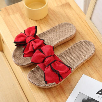 Stevvex Women Casual Linen Slippers with red bow details, pair on woven beige soles on Tampa Home & Garden Store