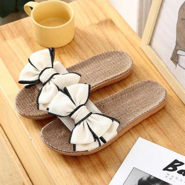 Women casual linen slippers with white bow accents and tan textured footbeds Stevvex on Tampa Home & Garden Store