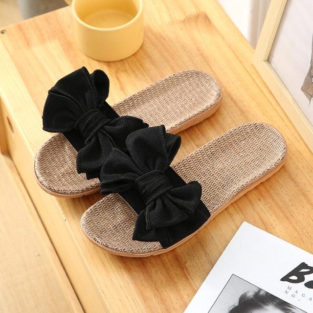 Women casual linen slippers with black bows, woven beige footbed, Stevvex ST85SH7894SEG pair on Tampa Home & Garden Store