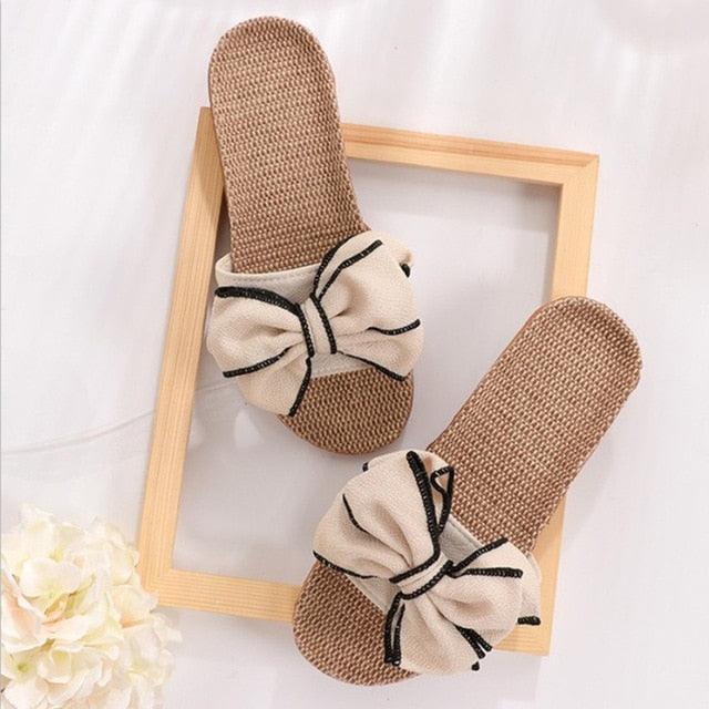 Stevvex women's linen bow sandals pair with beige woven footbed and striped bow on Tampa Home & Garden Store