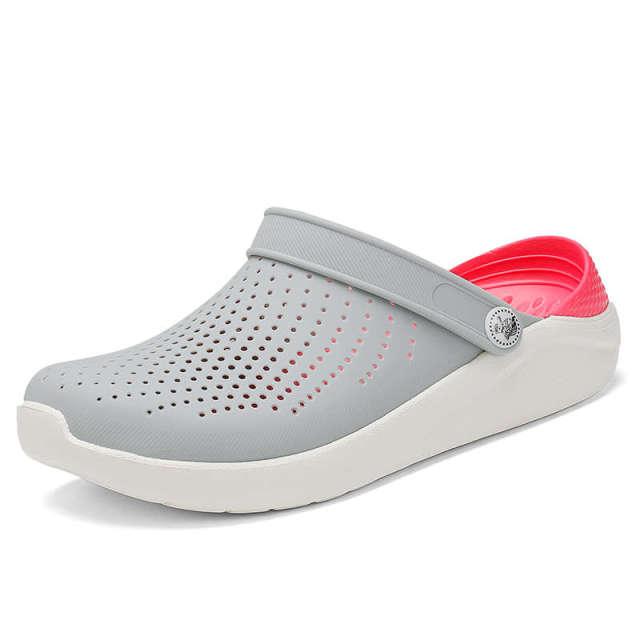 Stevvex women's grey perforated slip-on clogs with pink lining and white sole on Tampa Home & Garden Store