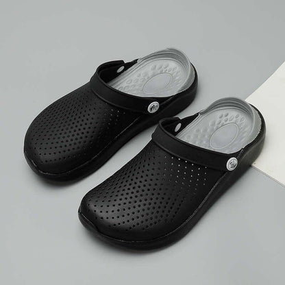 Stevvex black perforated slip-on clogs with strap, breathable water shoes pair on Tampa Home & Garden Store