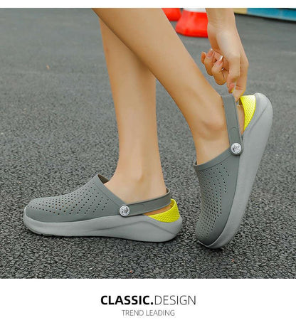 Stevvex gray perforated slip-on sandals with adjustable back strap and yellow heel on Tampa Home & Garden Store
