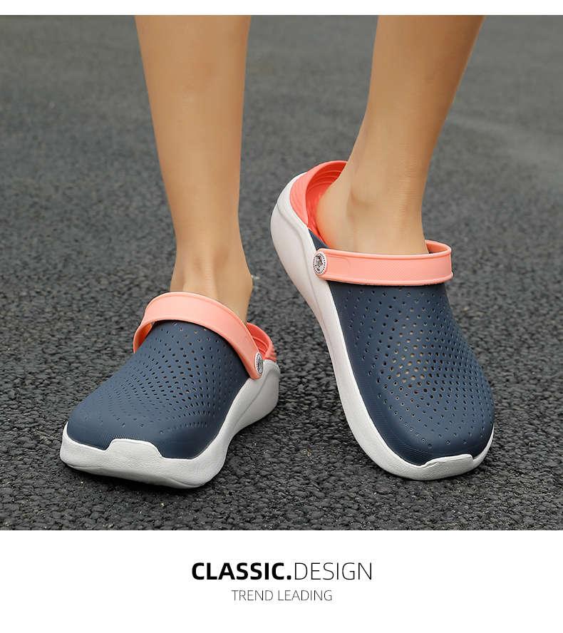 Women's navy perforated slip-on sandals Stevvex with coral pink strap and white sole on Tampa Home & Garden Store